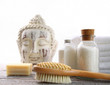 Photo: White towels with spa accessories against white White towels with spa accessories against white