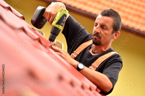 Photo: roof tiler roof tiler