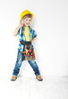 Photo: Little boy handyman with helmet and tool belt Little boy handyman with helmet and tool belt
