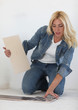 Young woman choose tiles