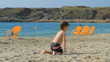 Video: Boy playing on the beach Boy playing on the beach