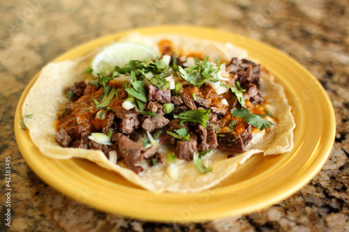 Photo: Steak taco at a Mexican restaurant. Steak taco at a Mexican restaurant.