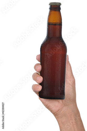 Photo: Hand Holding Bottle of Beer Hand Holding Bottle of Beer