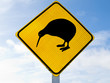 Attention Kiwi Crossing Road Sign