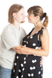 Portrait of a happy young pregnant woman with her husband