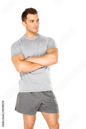Foto: Healthy muscular young man isolated on white Healthy muscular young man isolated on white