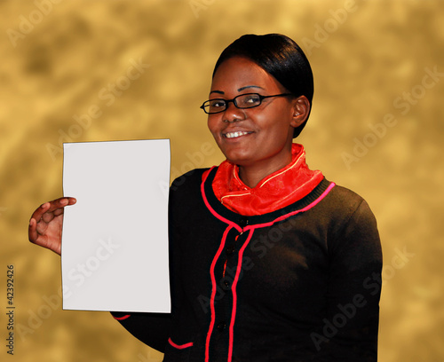 Photo: African Lady Holding Blank Document African Lady Holding Blank Document