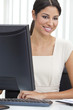 Hispanic Latina Woman or Businesswoman Using Computer in Office