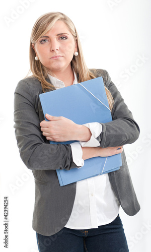 Photo: Serious young woman with file Serious young woman with file