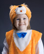 Little baby girl  dressed in a fox suit .