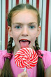 girl with a big candy lollipop