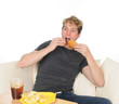 Young man overeating