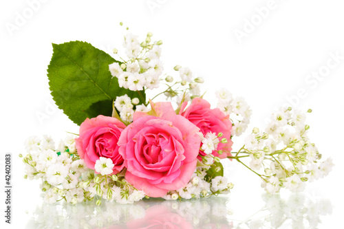 Photo: Pink roses in bouquet isolated on white Pink roses in bouquet isolated on white
