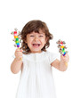 emotional child playing with musical toy