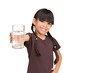 Little girl with a water glass