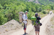 Foto: Woman tourist takes a snapshot of the nature Woman tourist takes a snapshot of the nature