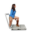 Photo: Beautiful Brunette Steps Out of a Laptop Beautiful Brunette Steps Out of a Laptop