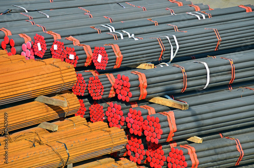 Photo: Stacked PVC and steel pipe ready for shipment Stacked PVC and steel pipe ready for shipment