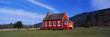 Photo: This is the Stone Lagoon School House. It is a one room school house. It is painted a bright red with white trim on the windows. There is a flag pole with no flag on it. The sky is blue and it is surrounded by green grass, bushes and trees. It is located in Northern California, not far from the Oregon border. This is the Stone Lagoon School House. It is a one room school house. It is painted a bright red with white trim on the windows. There is a flag pole with no flag on it. The sky is blue and it is surrounded by green grass, bushes and trees. It is located in Northern California, not far from the Oregon border.