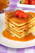 Photo: Stack of heart shaped pancakes with syrup and strawberry Stack of heart shaped pancakes with syrup and strawberry