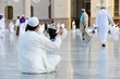 Muslim prayer at holy mosque