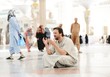 Muslim praying at Medina mosque