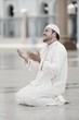 Muslim praying at Medina mosque