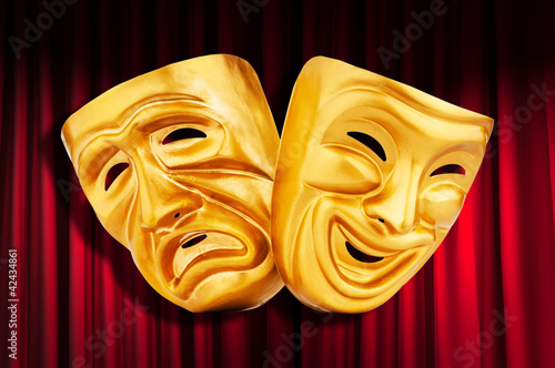 Photo: Theatre performance concept with masks Theatre performance concept with masks