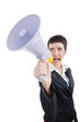 Young business lady screaming to loudspeaker