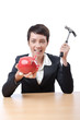 Woman and piggybank on white