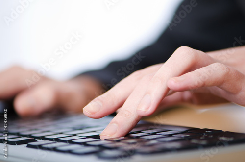 Photo: Hands typing on the keyboard Hands typing on the keyboard
