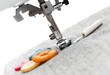 The sewing machine.