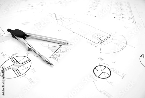 Photo: Compasses and drawing. Compasses and drawing.