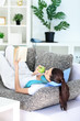 Photo: Girl relaxing at home Girl relaxing at home