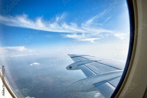 Photo: Looking over aircraft wing in flight Looking over aircraft wing in flight