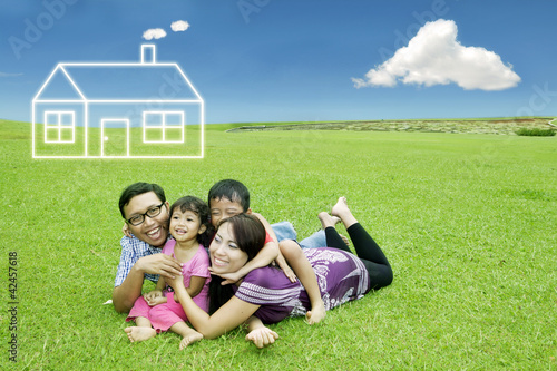Photo: Asian family with dream house Asian family with dream house