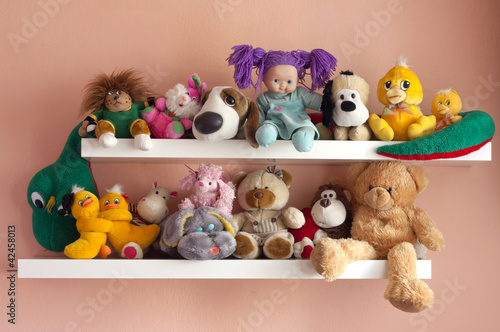Photo: toys child in the room on the shelf toys child in the room on the shelf