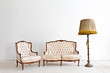 vintage luxury armchair in white room