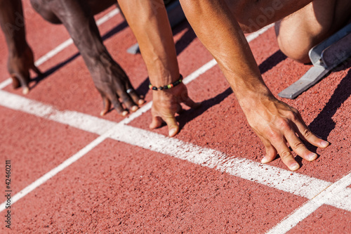 Photo: Two Track and Field Athletes before the Race Start Two Track and Field Athletes before the Race Start