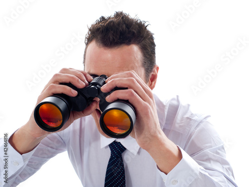 Photo: Businessman looking through binoculars Businessman looking through binoculars
