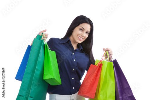 Photo: Happy Woman Holding Shopping Bags Happy Woman Holding Shopping Bags