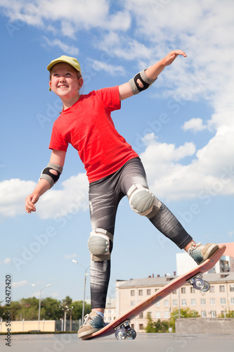 Photo: little girl - skateboarder little girl - skateboarder