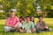 Happy teenage friends spending time together in the park