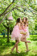 Twins in pink doll style