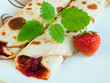Rolled pancakes with strawberries