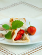 Rolled pancakes with strawberries