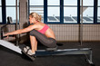 Woman On Indoor Rowing Machine