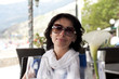 Foto: Beautiful woman in street cafe Beautiful woman in street cafe
