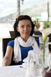 Foto: Beautiful woman in street cafe Beautiful woman in street cafe