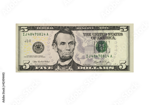 Photo: American five dollar banknote isolated over white American five dollar banknote isolated over white